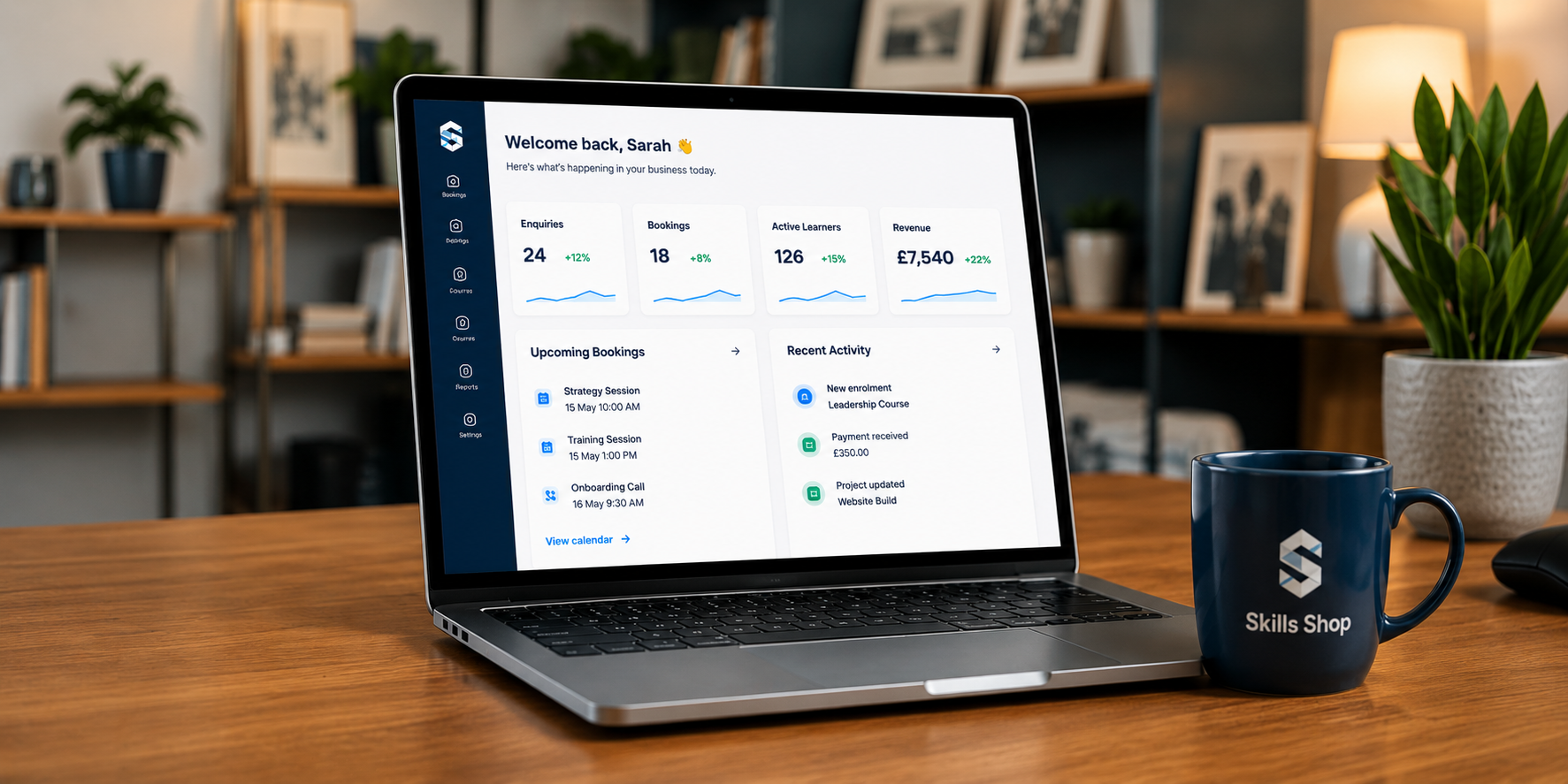 Laptop showing connected WordPress business platform dashboard beside Skills Shop mug in modern office workspace